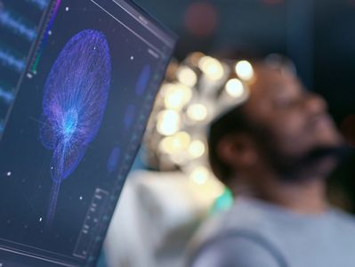 Brain activity being monitored with advanced technology in a clinical setting.