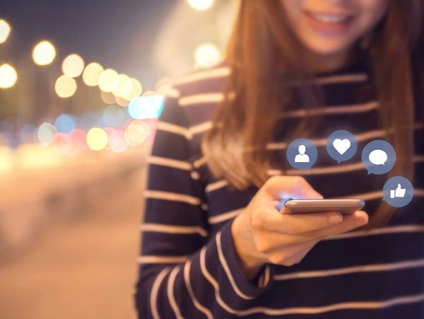 An illustration of an integrated engagement plan at work with social media symbols