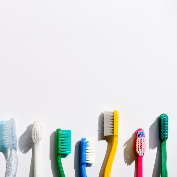 A LINE OF TOOTHBRUSH HEADS