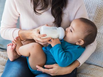 Infant drinking a bottle