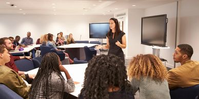 Instructor speaking in front of students