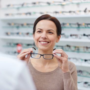 Woman in eye glass store.