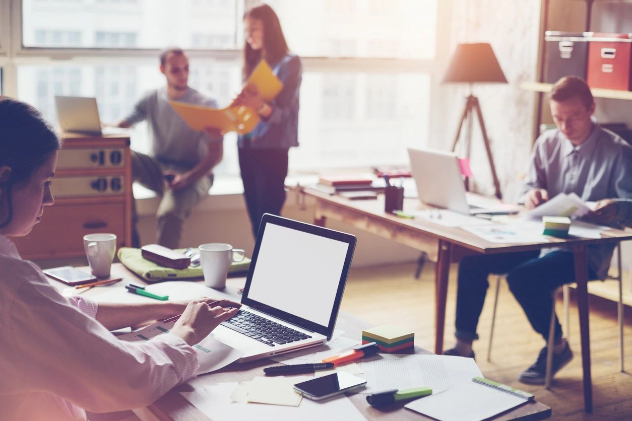 A team of people working in an office setting