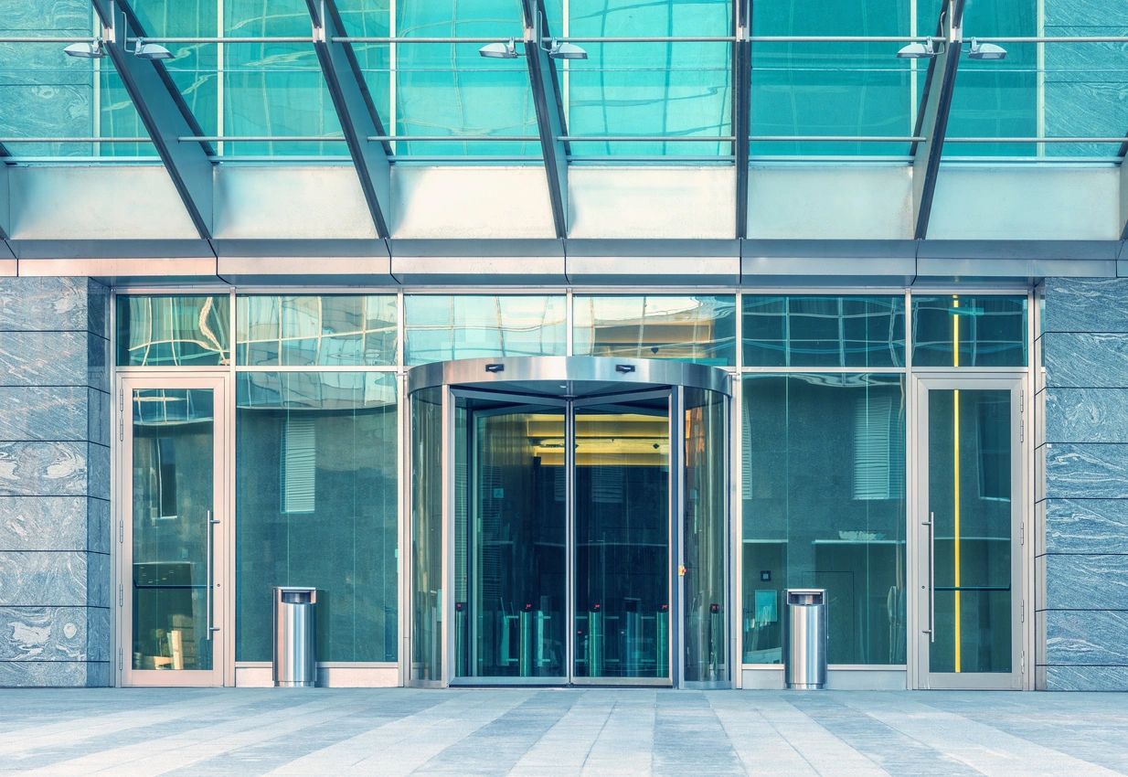 Entrance to a commercial office with a commercial revolving door