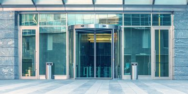 aluminum entrance doors and glass and metal canopy 