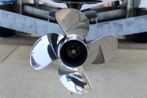 stainless propeller on an  outboard engine with 4 blade boat propeller