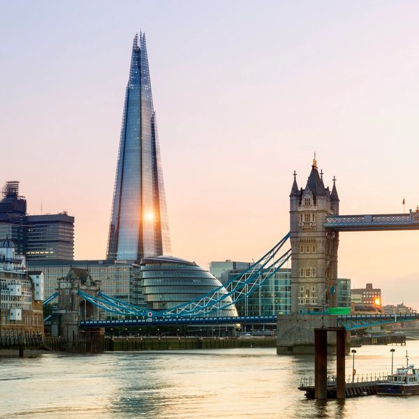 Sunset view of Tower Bridge and The Shard in London.