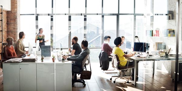 A group of people working with computers