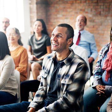 Image of a group of people in a meeting