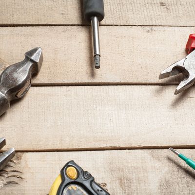 image of tools on a wooden workbench