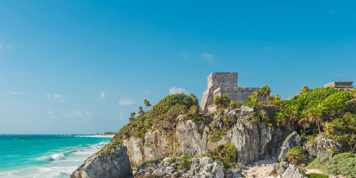Tulum Mayan Pyramids and archaeological ruins in beautiful white sand beaches,  blue oceans Mexico