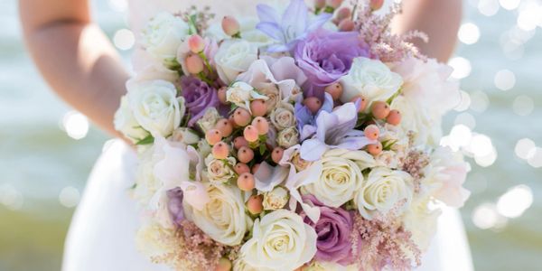 A bride holding Flower bouquet in her hand