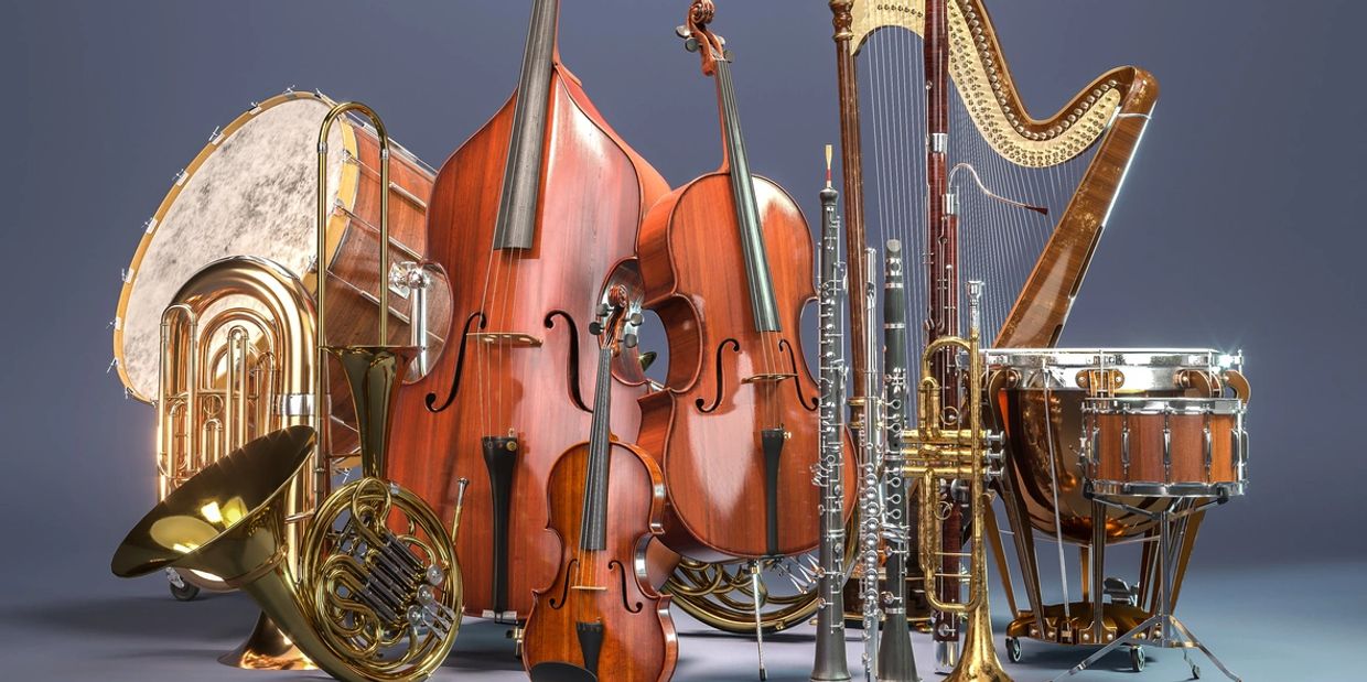 A collection of classical orchestral instruments arranged together.