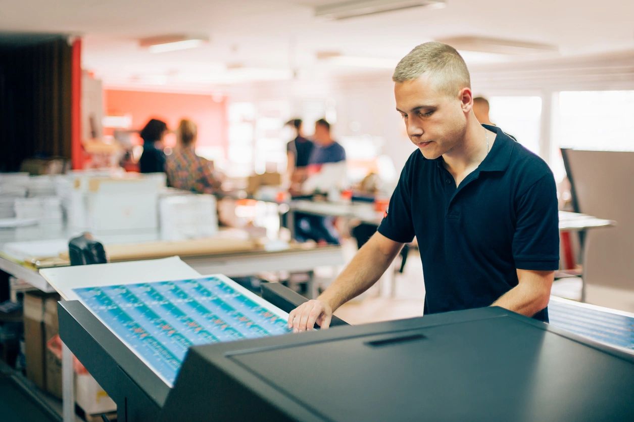 a man printing content.