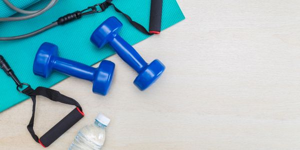 Hand held weights and resistance bands for pilates exercises