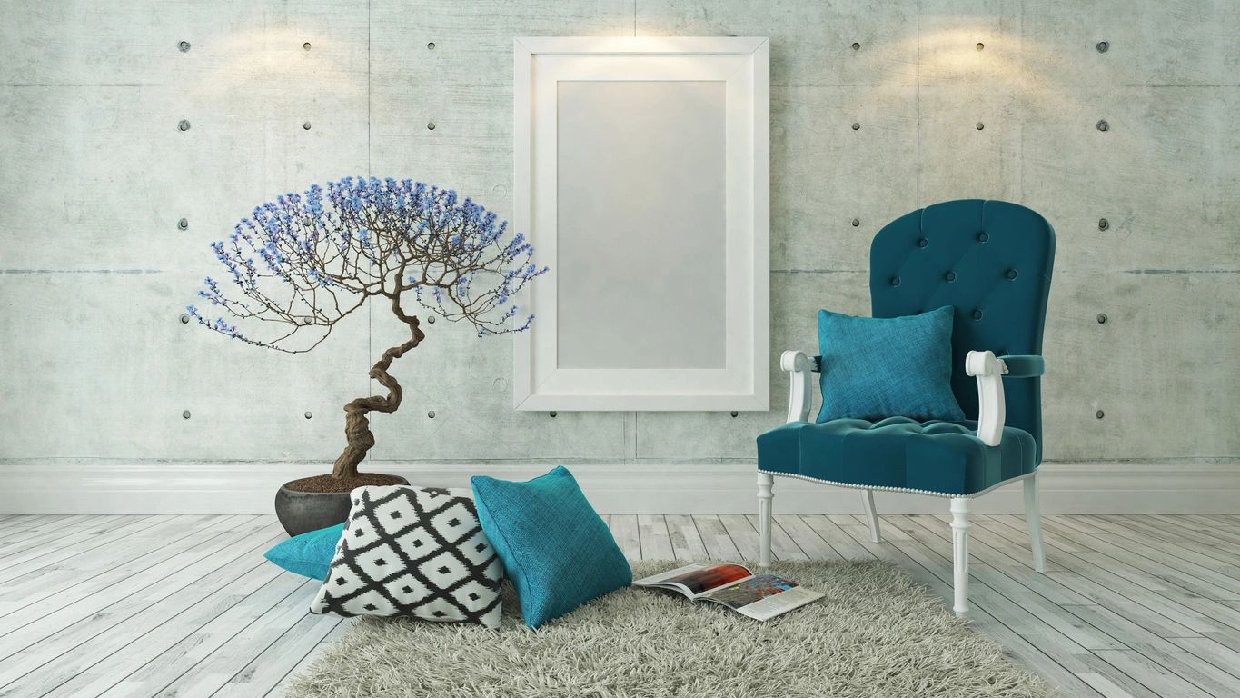 Room with a turquoise chair  matching pillow, shag rug, little tree blue flowers, book open on rug.