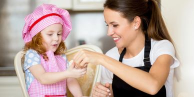 Nanny fun with children cooking 