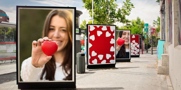 advertisements on a city street. 