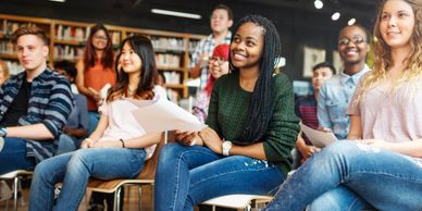 group of older students actively engaged in listening 