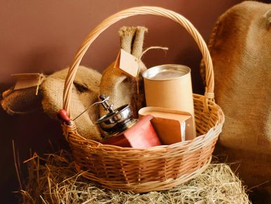 a gift basket of 6 free range eggs, loaf of fresh bread, apple or orange juice, butter etc