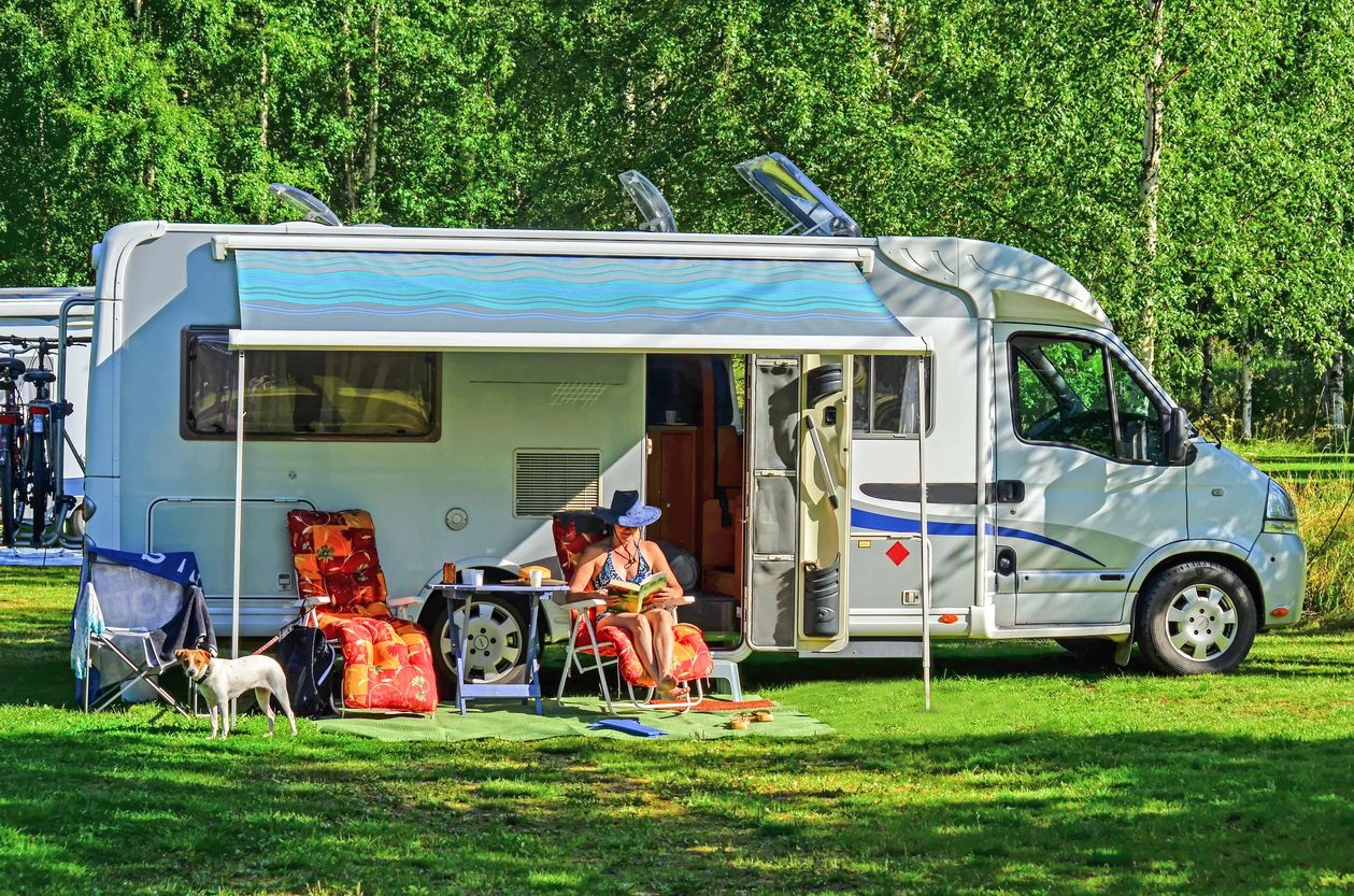 Family outside motor home