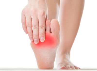 red patch indicating pain in base of foot 
