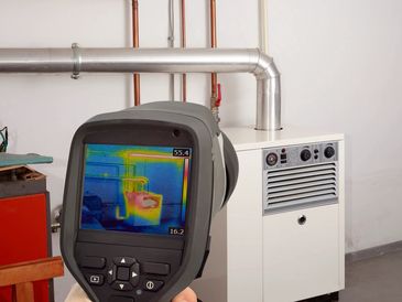 Thermal imaging camera identifying a clog in a water line used for heating