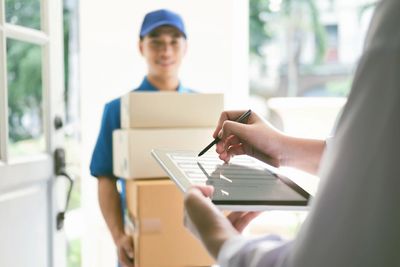 Scottish courier delivering a same day delivery parcel