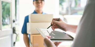 Courier delivering parcel to a customer