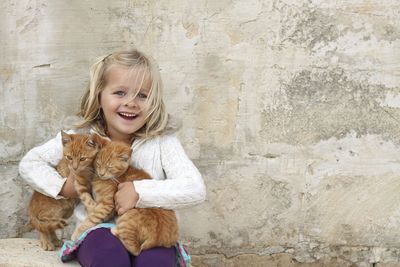 Girl with Two Cats