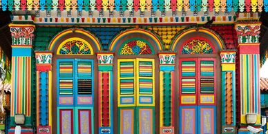 A number of brightly coloured doors