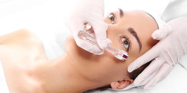 woman getting botilage injections on her face
