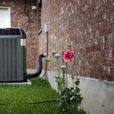 an AC unit outside a home