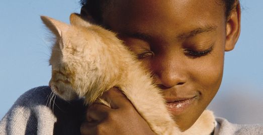 beautiful boy with his pet