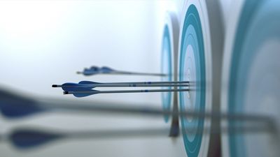 Three arrows hitting the bullseye on targets.