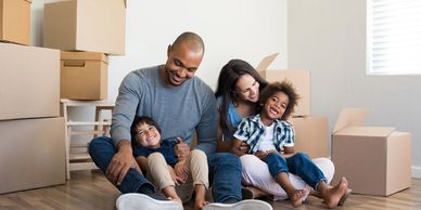 family unpacking from moving 