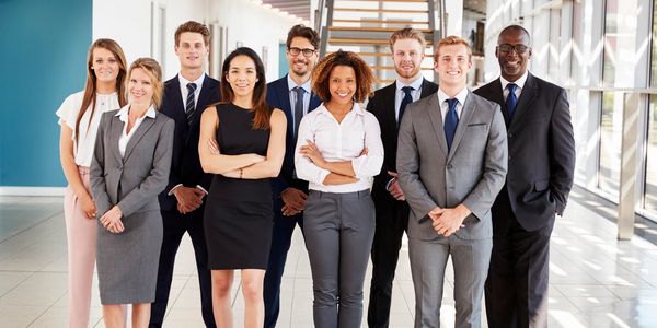 Group of waste minimisation consultants smiling