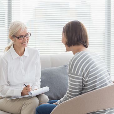 A therapist & client to describe services at Evans Family Counselling & Psychotherapy