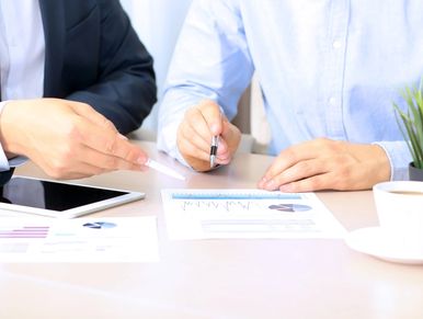 Two people going over paperwork