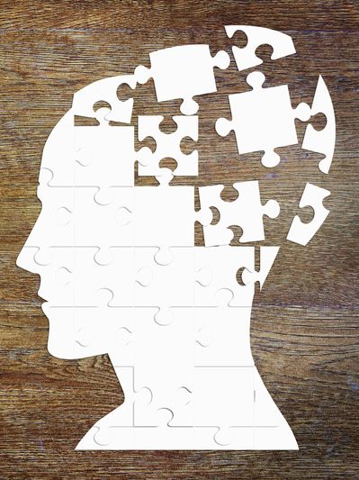 Premier Medical Concierge Naples and Bonita Springs cognitive health: human brain with puzzle pieces