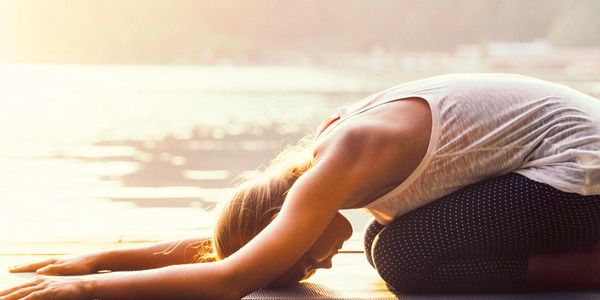 woman doing yoga stretch 