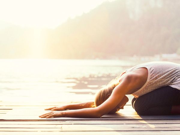 Mindful Movement and Sensory-Enhanced Yoga, childs pose, lake, sunshine