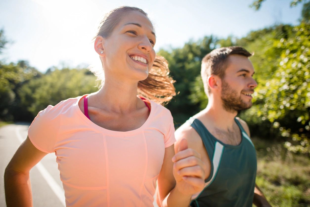 woman and man running