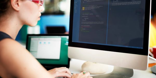 Woman looking at her laptop