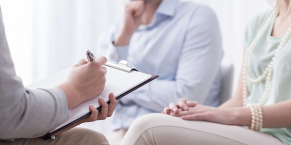 A couple at a therapy session.