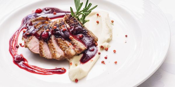 Indigenous Smoked Duck with a berry coulis