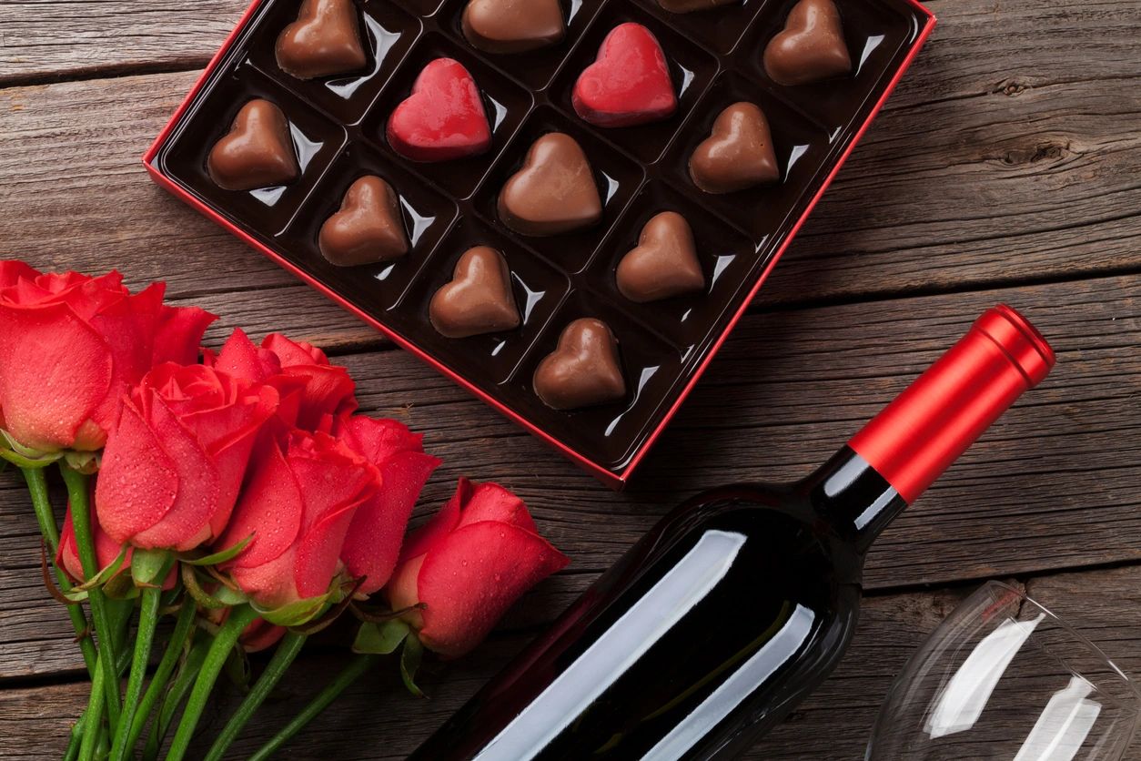 Valentine's Day roses, heart-shaped chocolate, bottle of wine in Richmond Hill, ON.