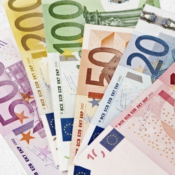 A fan of various Euro banknotes including 500, 200, 100, 50, 20, and 10 euros.