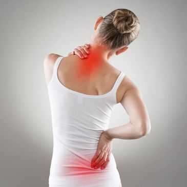 The back of a women with red coloring on her hips and neck showing pain. 