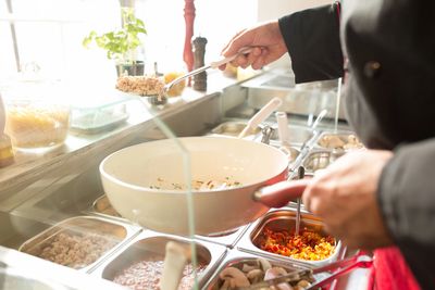 Person fixing and serving food